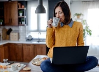 Female - In Kitchen on Laptop